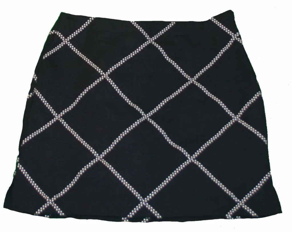 Like New EP Pro Navy Blue Skort with small polka dot ribbon in window pane pattern Size 6